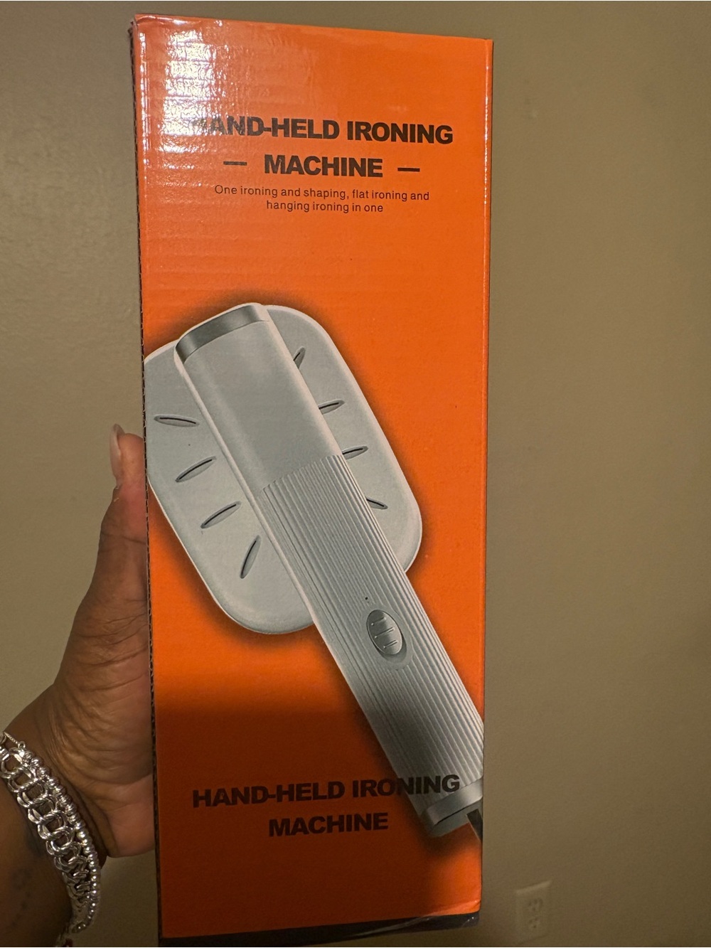 Hand-Held Ironing Machine